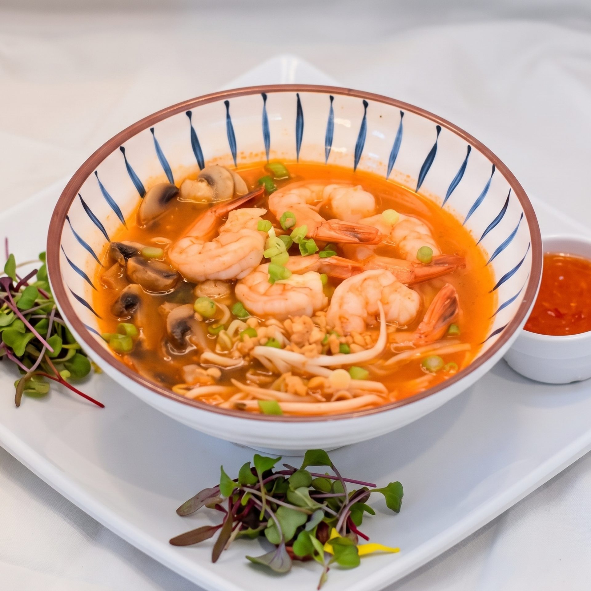 The menu starts with noodles